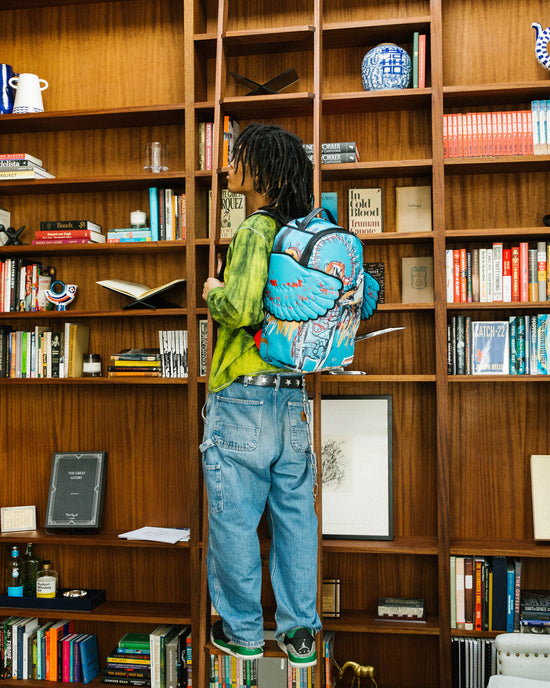 Sprayground OFFICIAL BASQUIAT UNTITLED (FALLEN ANGEL) 1981 WING BACKPACK (DLXV)