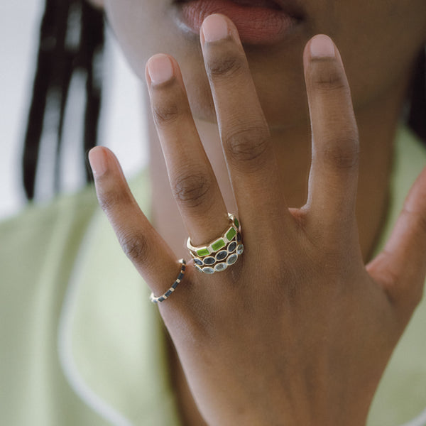 Starling Peridot Emerald Cut Bezel Set Band