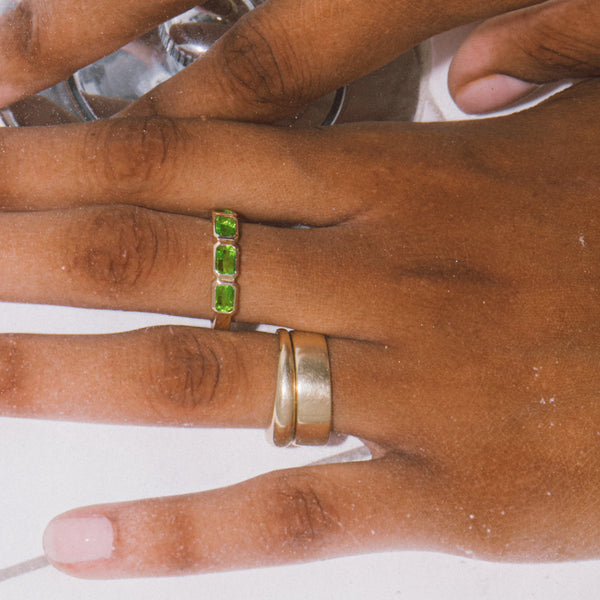 Starling Peridot Emerald Cut Bezel Set Band