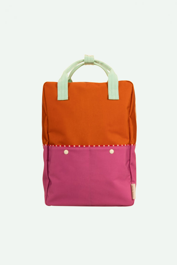 sticky lemon backpack large | better together | colourblocking | gravel orange