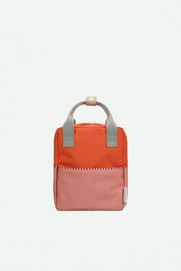sticky lemon backpack small | colourblocking | lifebuoy orange + coral pink