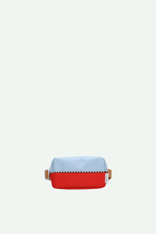 sticky lemon fanny pack | colourblocking | zissou blue + red hat