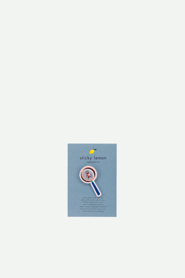 sticky lemon embroidered pin | magnifying glass
