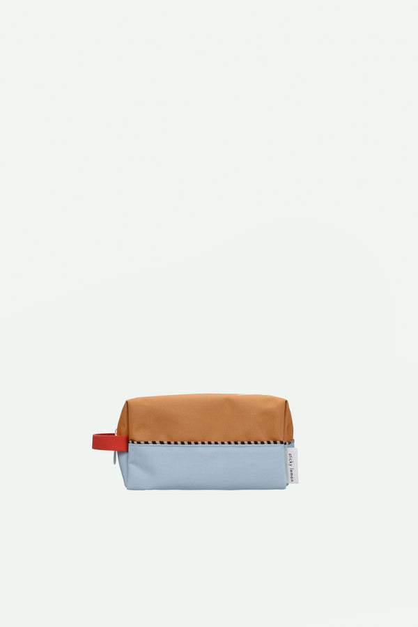 sticky lemon toiletry bag | colourblocking | jane beige + zissou blue