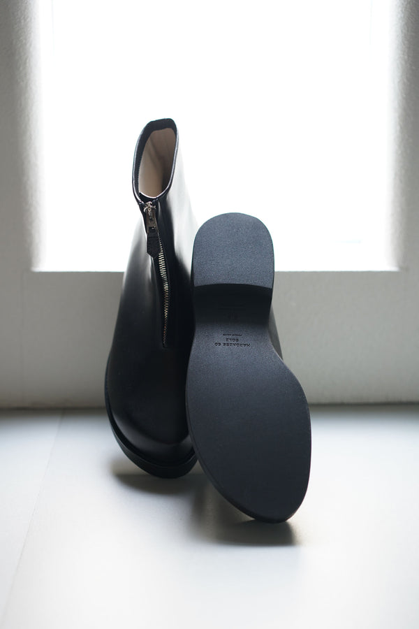 still by hand foot the coacher / OBLIQUE FRONT ZIP