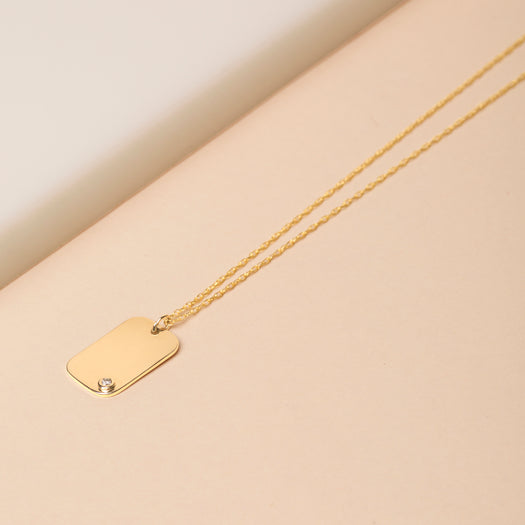 Stone And Strand Dog Tag With Teeny Diamond Pendant