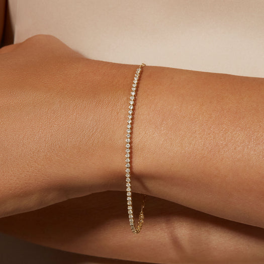 Stone And Strand Drop Shot Diamond Tennis Bracelet