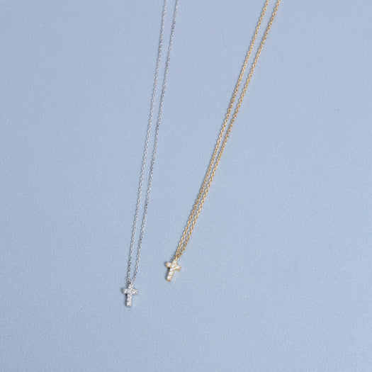 Stone And Strand Tiny Diamond Cross Necklace