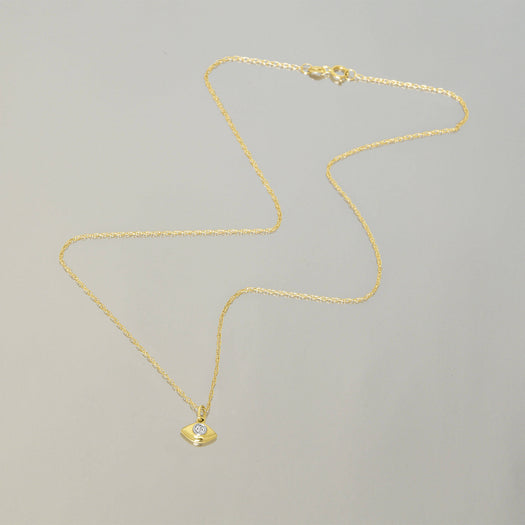 Stone And Strand Tiny Evil Eye Diamond Necklace