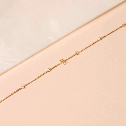 Stone And Strand Tiny Pearl And Gold Bead Initial Bracelet