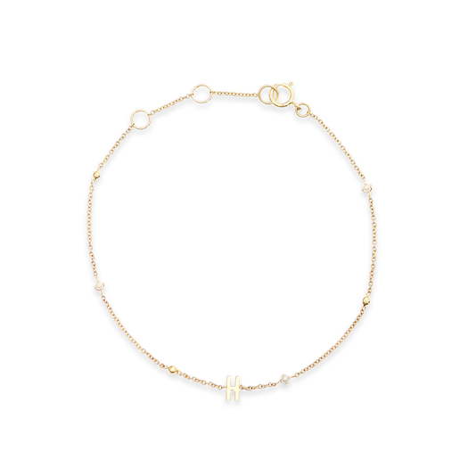 stone and strand Tiny Pearl and Gold Bead Initial Bracelet
