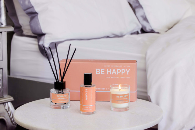 Stoneglow Wellbeing - Be Happy - Gift Set - Essential Oil Scented Votive Candle (65 X 55mm) - Scented Reed Diffuser (50ml) - Scented Pillow Mist (50ml)
