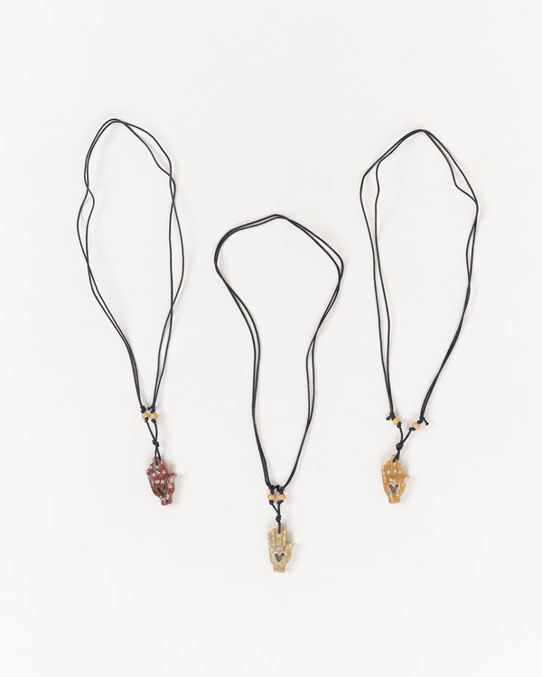 Story Mfg. Hand Carved Necklace - Generosity Hand