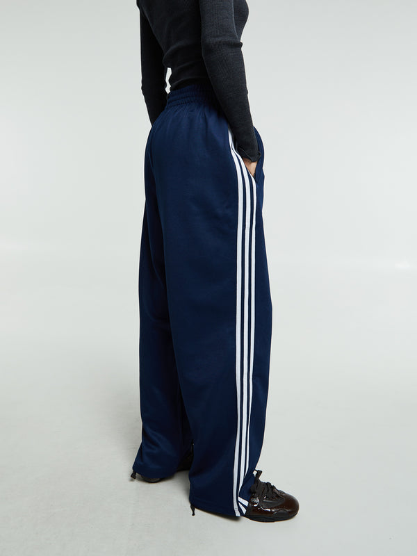 Stoy Adicolor Baggy Fit Firebird Track Pants In Night Indigo
