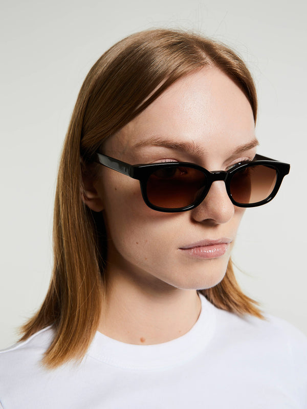 Stoy Le Bucheron Sunglasses In Solid Black And Brown Gradient Lens