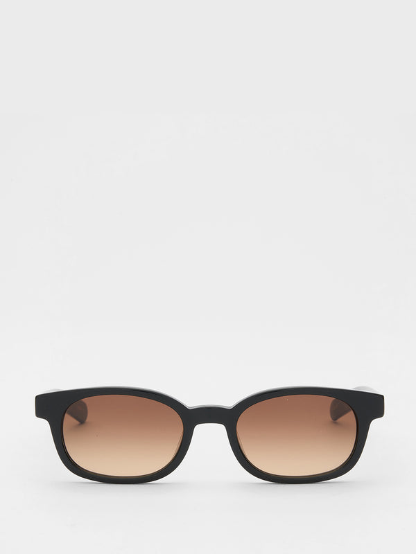 stoy Le Bucheron Sunglasses in Solid Black and Brown Gradient Lens