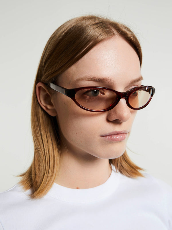 Stoy Olympia Sunglasses In Crystal Burgundy And Solid Peach Lens