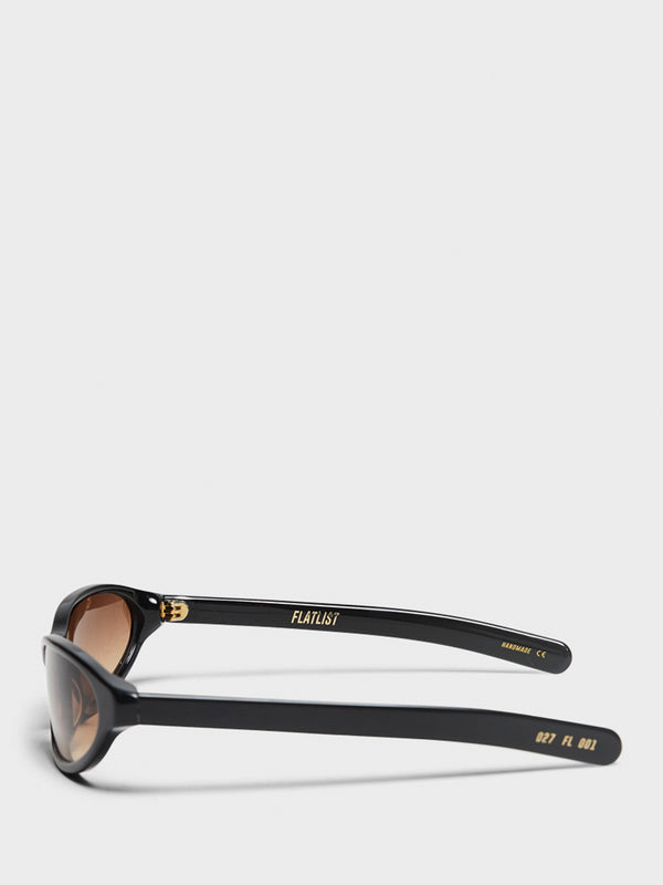 Stoy Olympia Sunglasses In Solid Black And Brown Gradient Lens