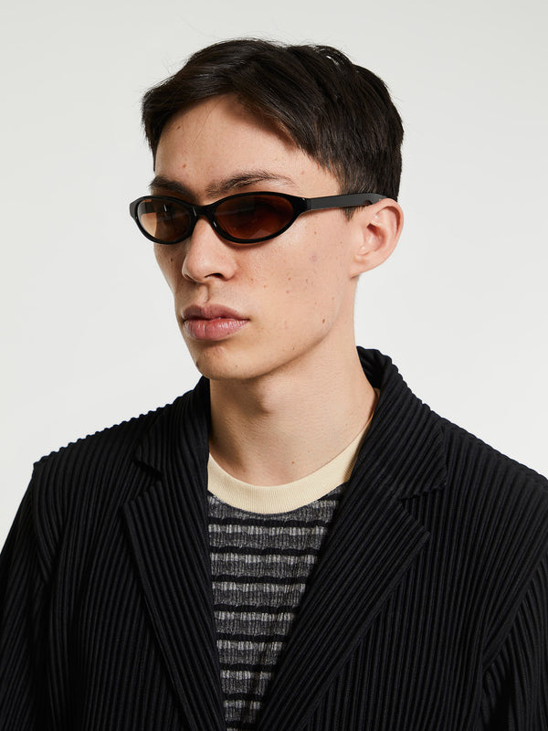 Stoy Olympia Sunglasses In Solid Black And Brown Gradient Lens