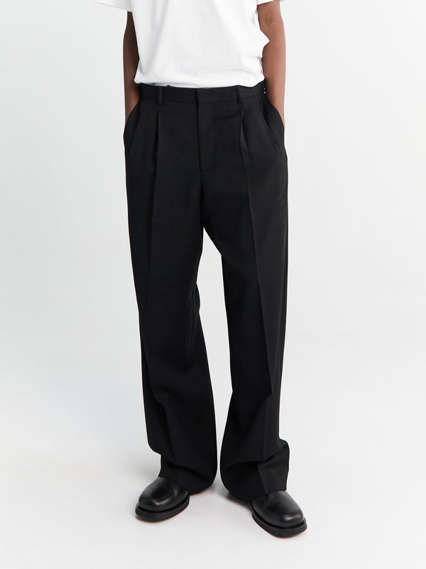 Stoy Wide Pleated Trousers In Black