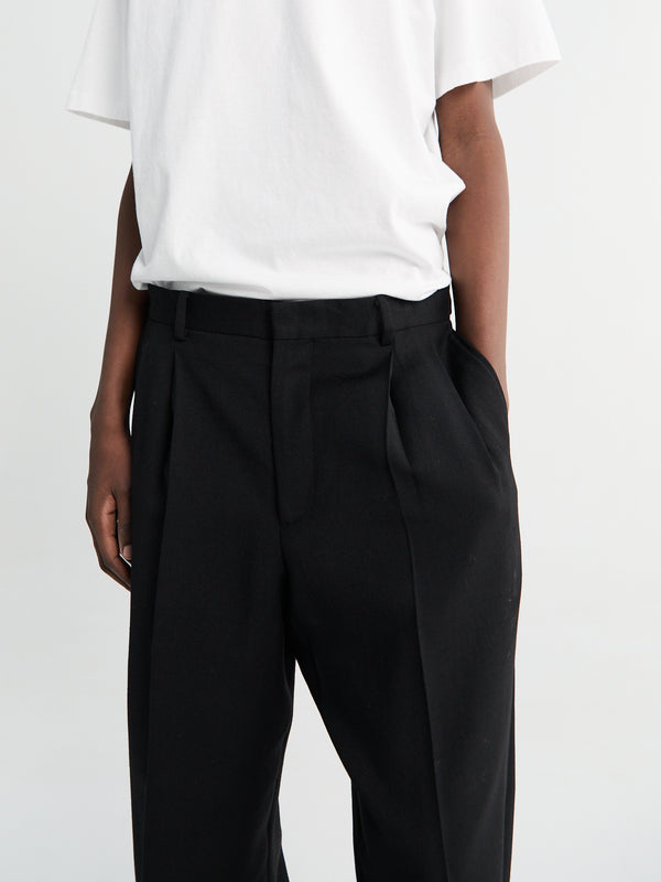 Stoy Wide Pleated Trousers In Black