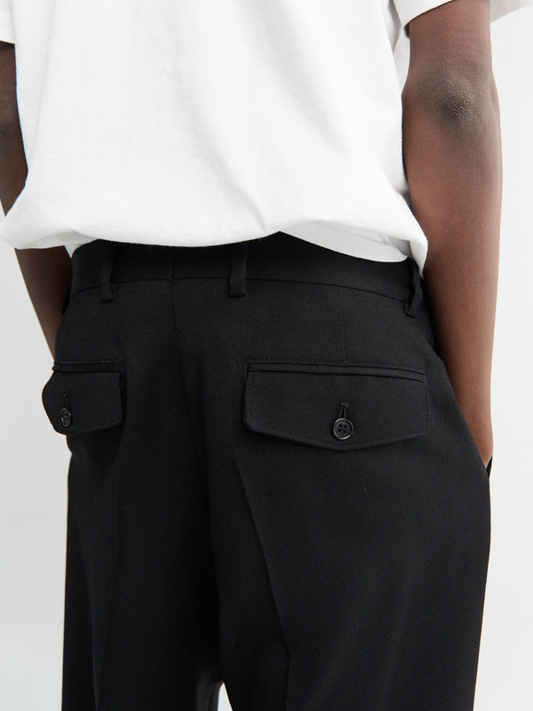 Stoy Wide Pleated Trousers In Black