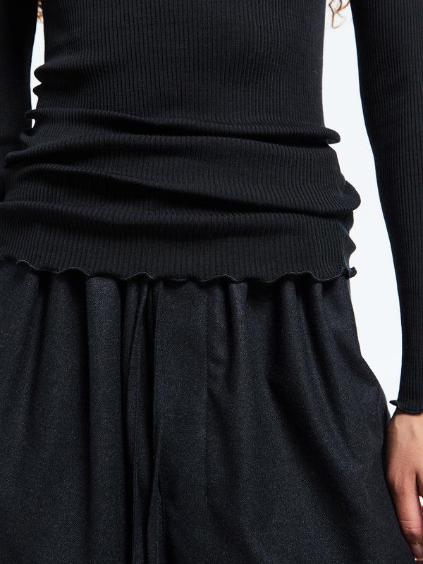 Stoy Wool & Silk Long Sleeve Rib Turtleneck Top In Black