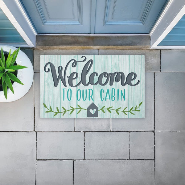 Stupell Industries Amanda McGee | Cabin Welcome Whimsical Script Non-Woven Door Mat