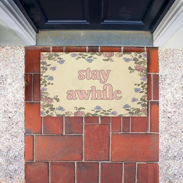 Stupell Industries Stupell Studio | Stay Awhile With Floral Border Non-Woven Door Mat