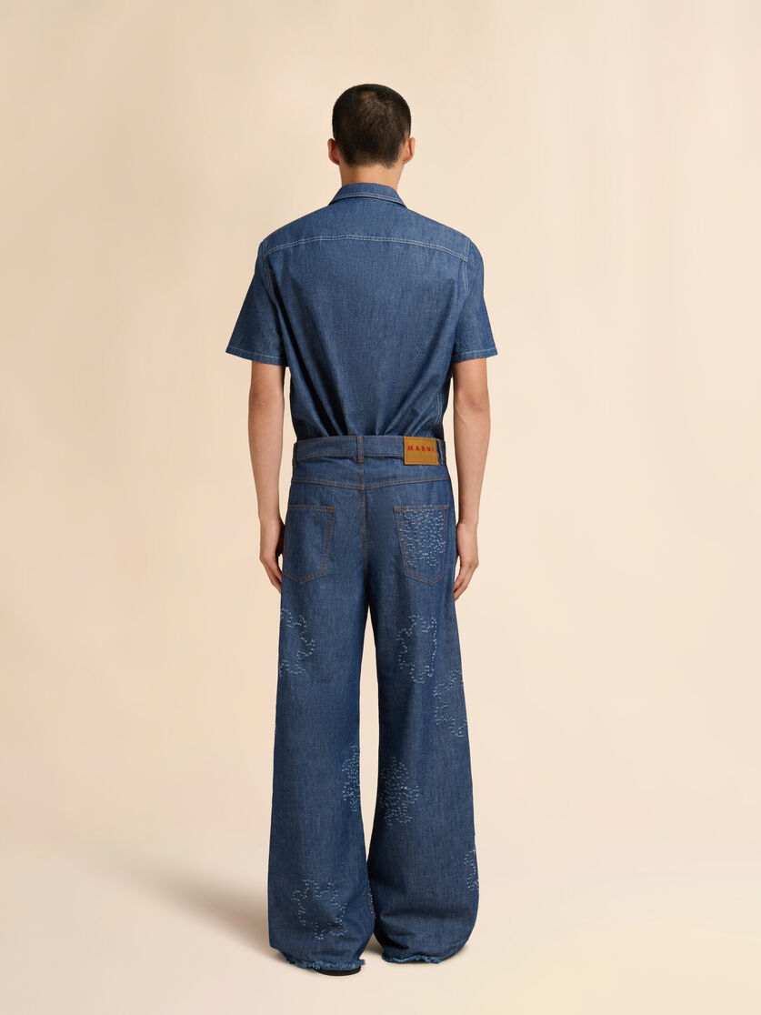 Stutterheim X Marni Blue Chambray Jeans With Frayed Sun Motif