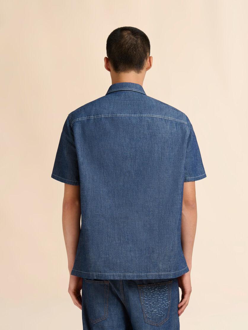 Stutterheim X Marni Blue Chambray Short-sleeved Shirt With Frayed Sun Motif