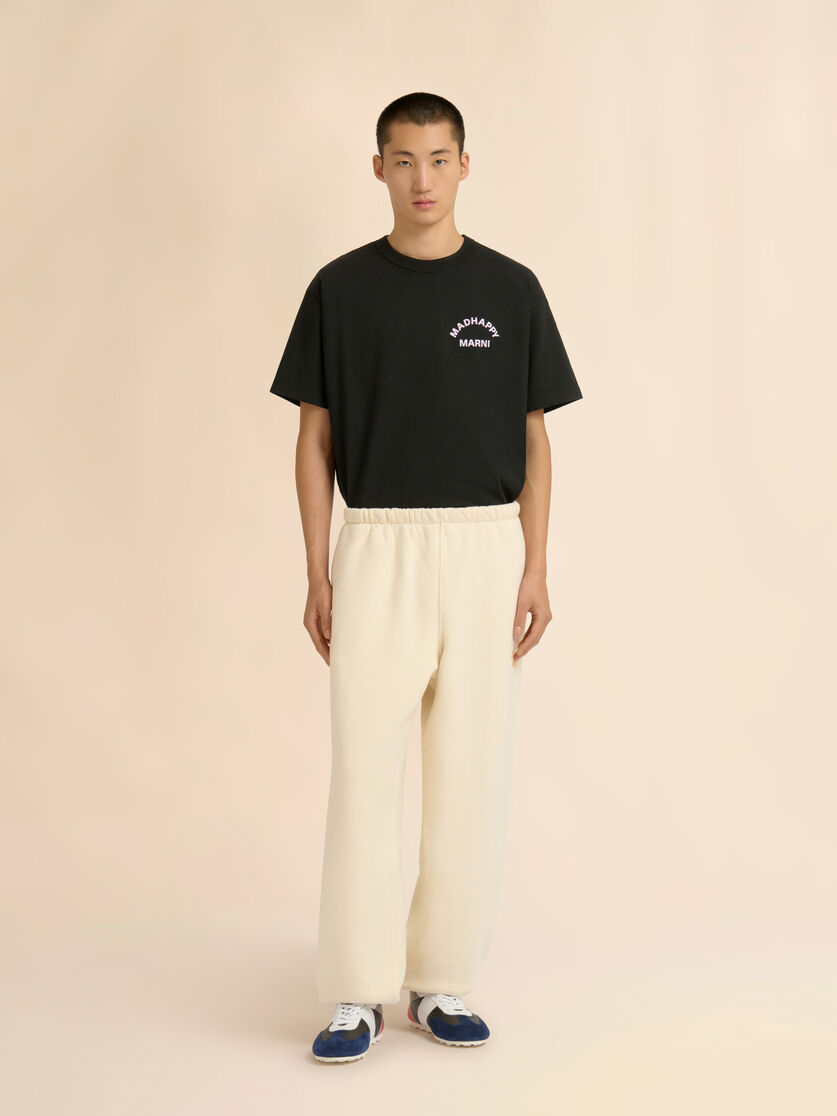 Stutterheim X Marni Marni + Madhappy Cream Cotton Sweatpants With Arch Logo Print