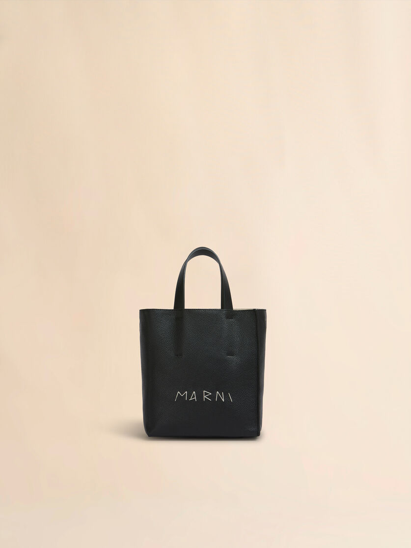 stutterheim x marni Museo Soft Mini Bag in black leather with Marni Mending
