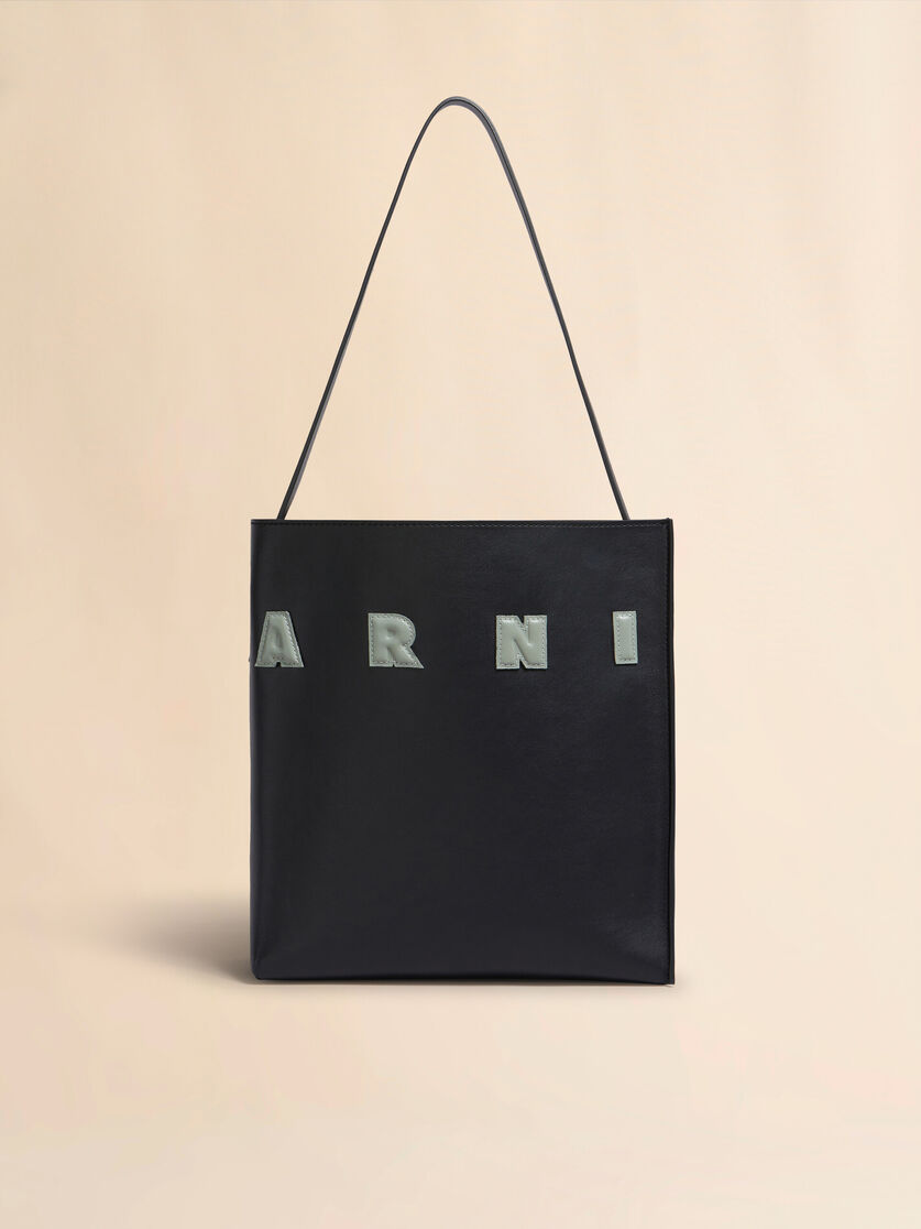 stutterheim x marni Small black leather Museo hobo bag with patches