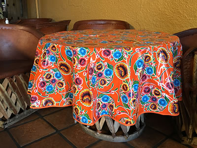 sugar skull Round Oilcloth – Floral on Orange with red trim