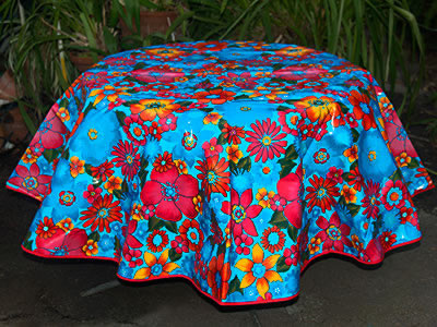 sugar skull Round Oilcloth Tablecloth – Flower Fields on Light Blue with blue trim