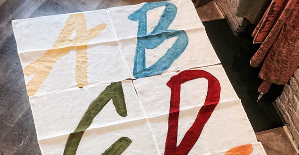 Summerill & Bishop Alphabet Napkin 'A' In Lemon Yellow 50x50cm