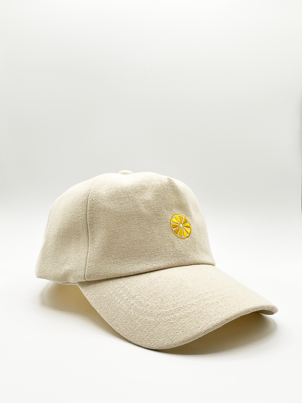 Svnx DANIA Cotton Baseball Cap With Lemon Embroidery In Cream