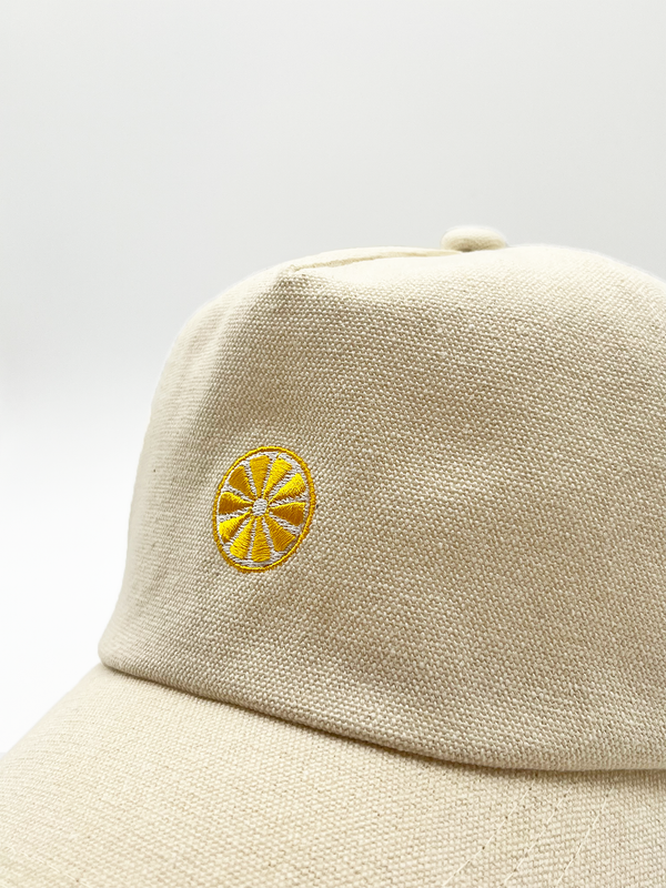 Svnx DANIA Cotton Baseball Cap With Lemon Embroidery In Cream