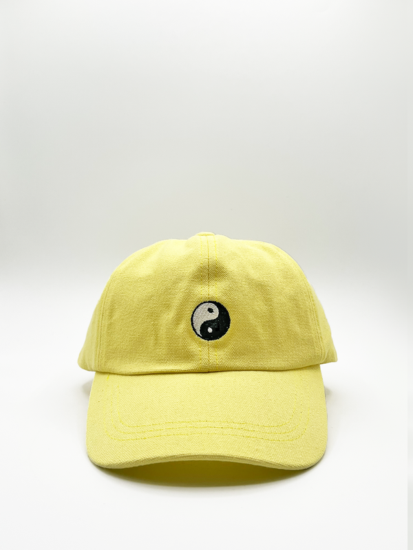 svnx SHAY Cotton baseball cap with 'ying yang' embroidery in lemon yellow