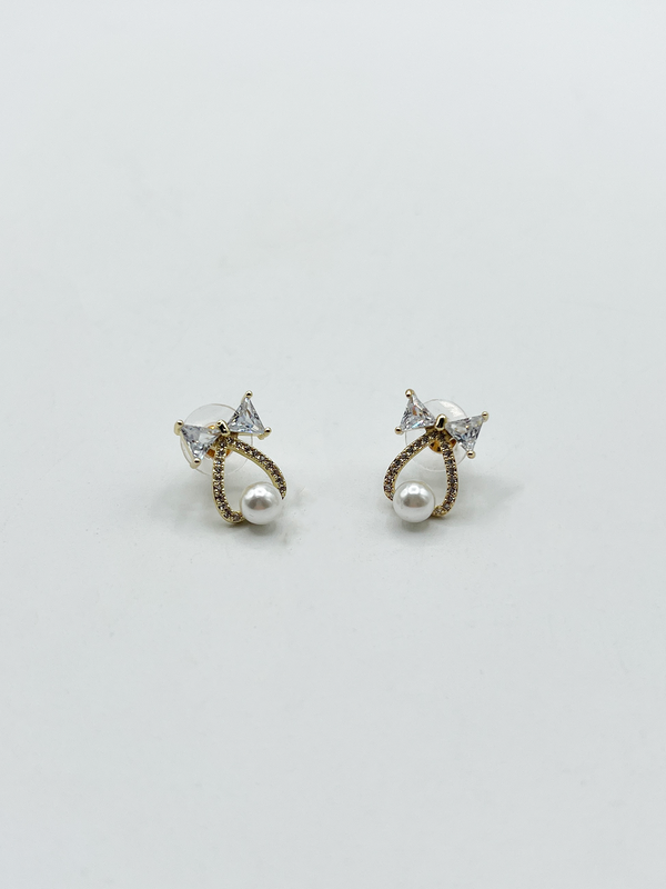 Svnx Studded Bow Earrings With Hanging Pearl In Gold - Gift Boxed