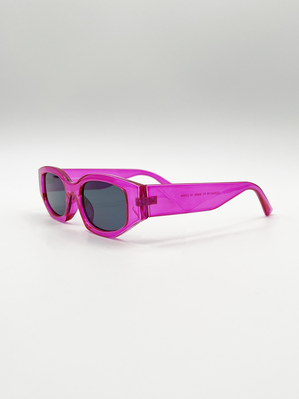 Svnx Angular Sunglasses In Translucent Hot Pink
