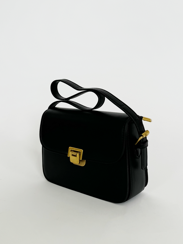 Svnx Black Shoulder Bag With Gold Clasp Fastening