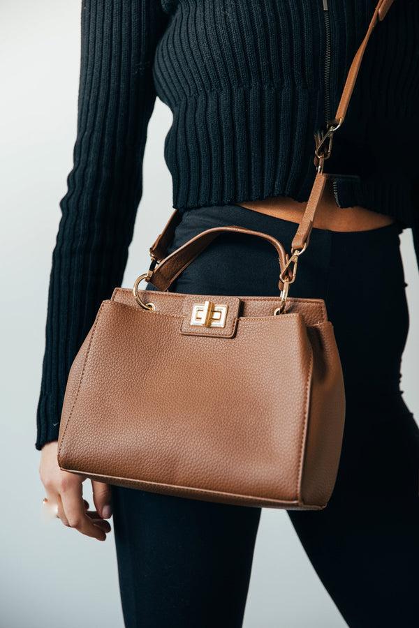 svnx Brown faux leather handbag with gold trim