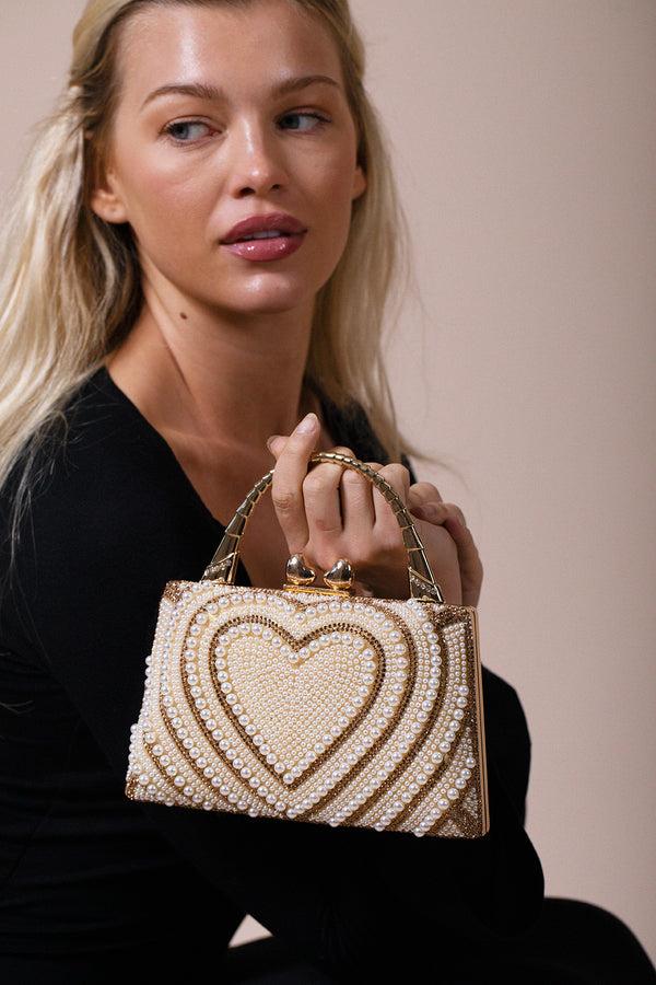 Svnx Heart Pearl Clutch Bag In Gold