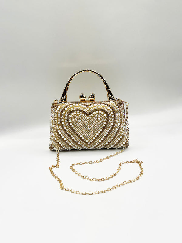 Svnx Heart Pearl Clutch Bag In Gold