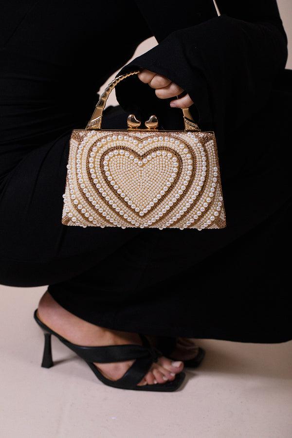 svnx Heart Pearl Clutch Bag In Gold