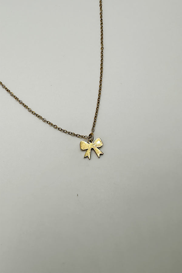 Svnx Mini Bow Pendant Necklace In Gold