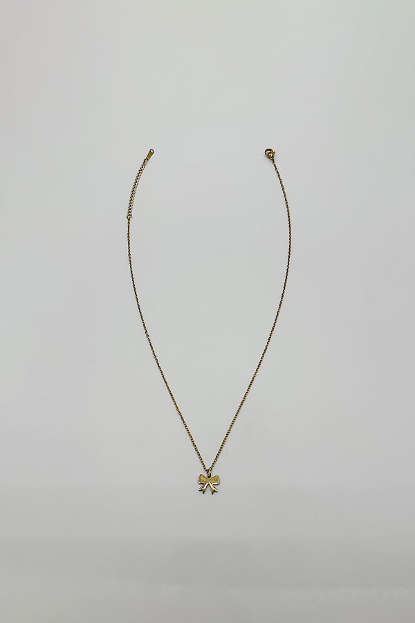 Svnx Mini Bow Pendant Necklace In Gold