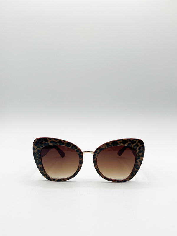 svnx Oversized Cat-Eye Sunglasses in Brown Red